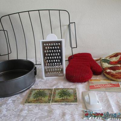 Tupperware coarse grater, roasting rack, hot pads, coasters, 9" springform cake pan, recipe tab index cards
