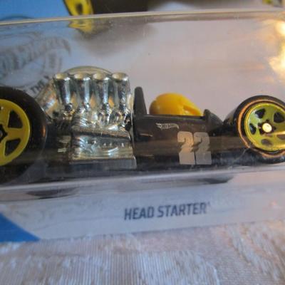 2 Hot Wheel cars