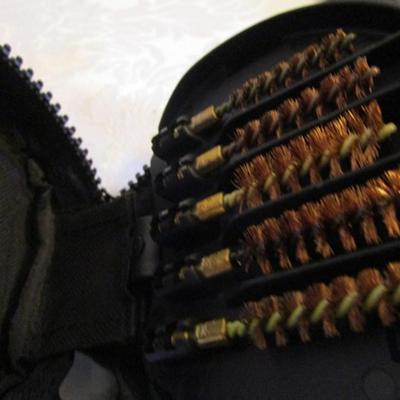 Otis breech-to-muzzle gun cleaning systemwith case