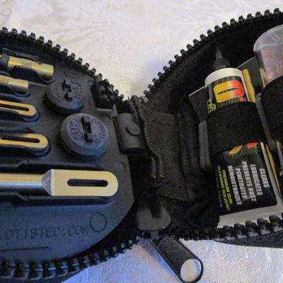 Otis breech-to-muzzle gun cleaning systemwith case