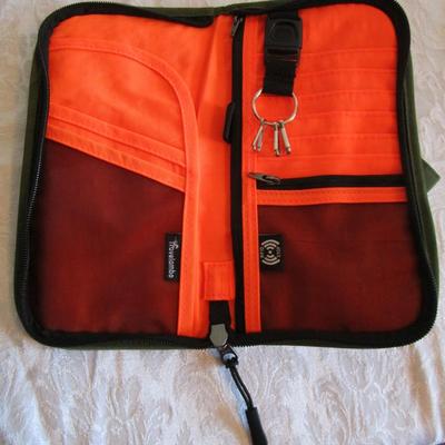 Sale Photo Thumbnail #435: Army green with orange interior 9" x 5", Has outside zipper pocket, New, see pictures