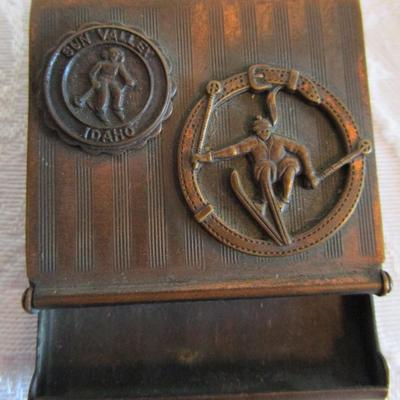 Vintage Metal match holder/dispenser, cast with "Sun Valley Idaho" & and skiier decorations on top