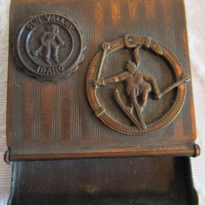 Vintage Metal match holder/dispenser, cast with "Sun Valley Idaho" & and skiier decorations on top