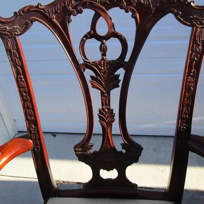 Vintage padded, carved wood captain's chair, needs upholstering