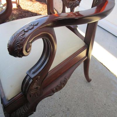 Vintage padded, carved wood captain's chair, needs upholstering