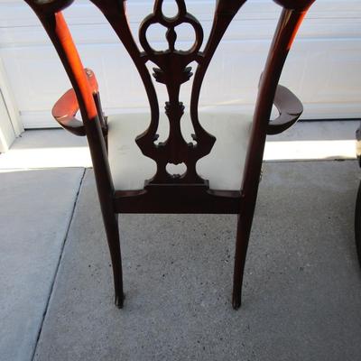 Vintage padded, carved wood captain's chair, needs upholstering