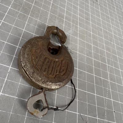 Antique Steel Padlock with a Key 