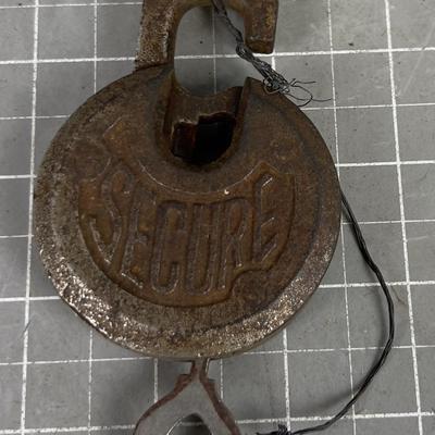 Antique Steel Padlock with a Key 