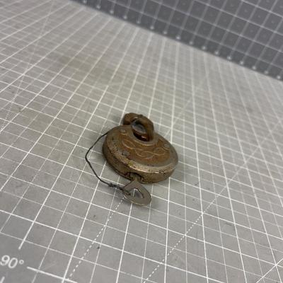 Antique Steel Padlock with a Key 