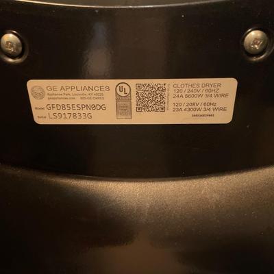 GE front load washer and dryer on pedestals
