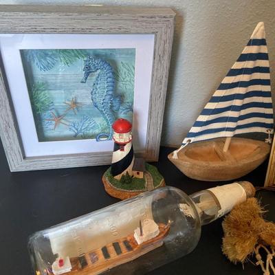 Sailboat and lighthouse decor