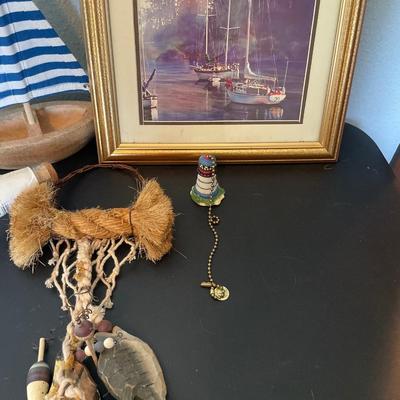 Sailboat and lighthouse decor