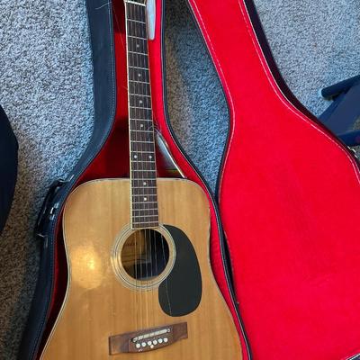 Jadee acoustic guitar and case