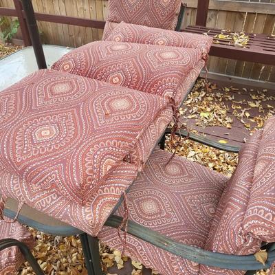 Lot includes 4 outdoor chairs, 1 outdoor table, and 1 umbrella