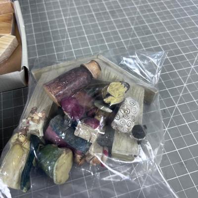 2 Small Nativity Sets; 1 Resin and 1 Wood. 