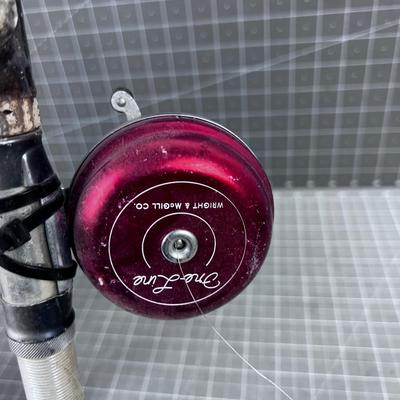 Grouping of Vintage Fishing Poles 