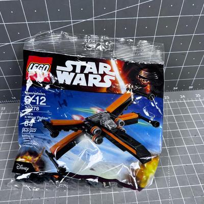 2 Small Lego Sets; X wing Fights & Lego Movie Land Set