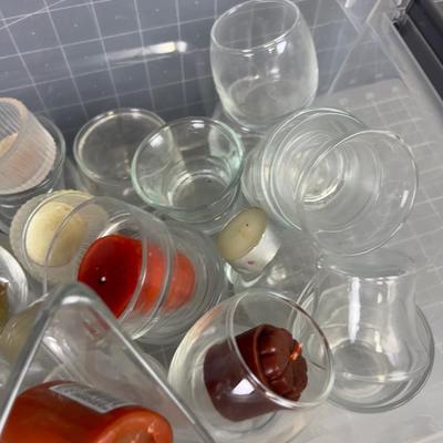 Tub Full of Glass Votive Holders and Mixed Colored Candles