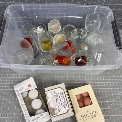 Tub Full of Glass Votive Holders and Mixed Colored Candles
