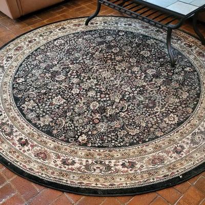 Round rug, black and tan