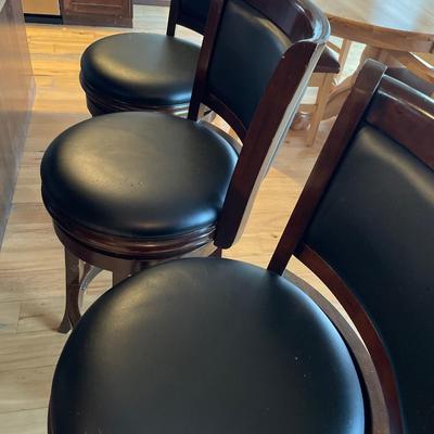 Black pad & dark wood bar stools