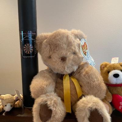 Magnetic dart board and stuffed animals