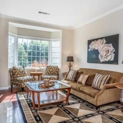 Gorgeous like new Mitchell Gold and Bob Williams sofa with matching ottoman