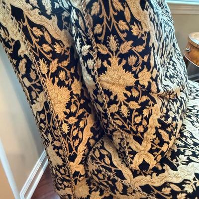 Two cream and black custom chairs from the Design Source
