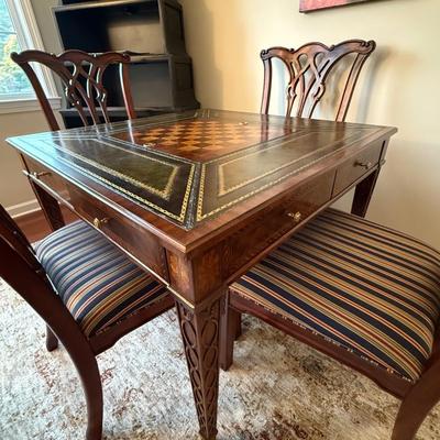 Most amazing Scarborough Maitland Smith game table with four chairs