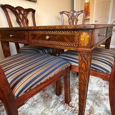 Most amazing Scarborough Maitland Smith game table with four chairs