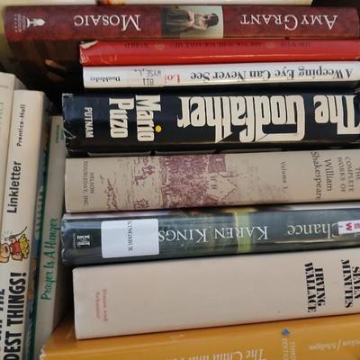 Mostly hardback books, Colorado book, Yearbook, and great stories by wonderful authors with book racks