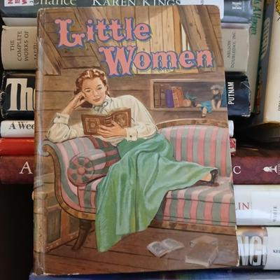 Mostly hardback books, Colorado book, Yearbook, and great stories by wonderful authors with book racks