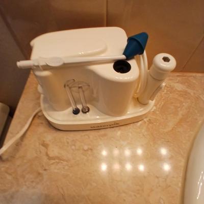 Waterpik machine with razor and a new nightlight