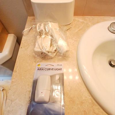 Waterpik machine with razor and a new nightlight