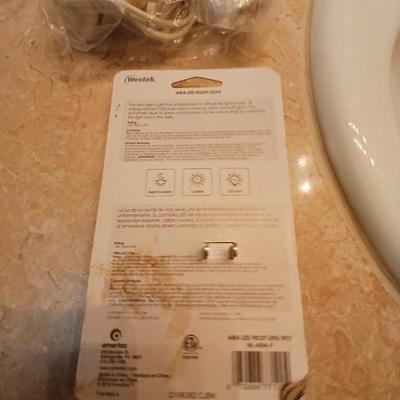 Waterpik machine with razor and a new nightlight