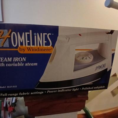 Ironing board with Iron and net bags for fragile laundry