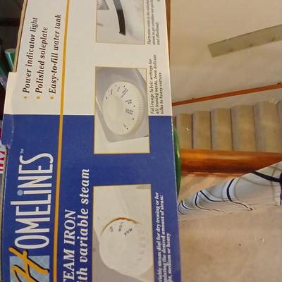 Ironing board with Iron and net bags for fragile laundry