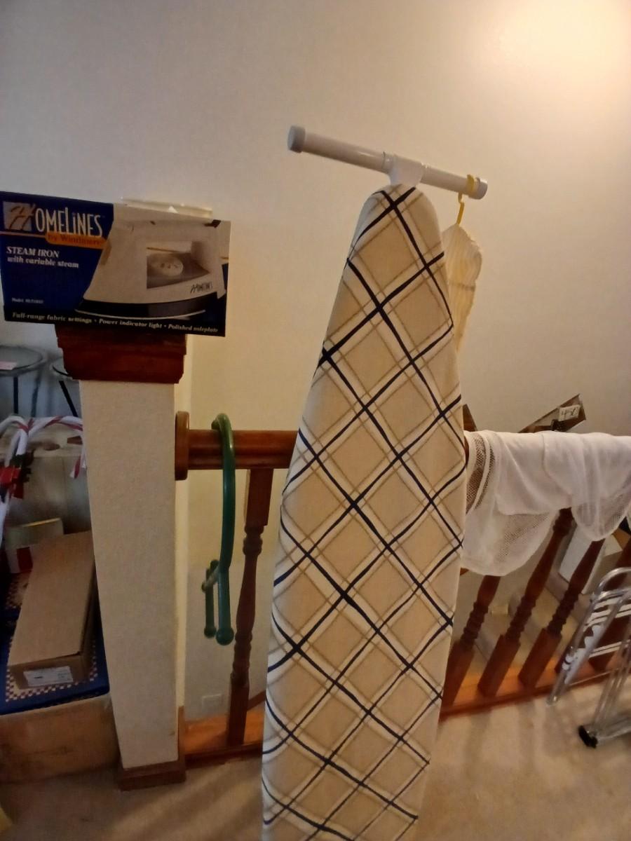 Ironing board with Iron and net bags for fragile laundry