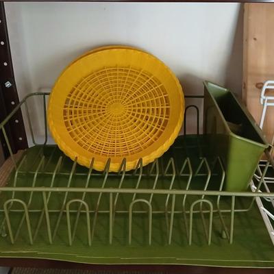 Under the shelf racks, with kitchen dish rack paper plate holders and a nice cutting board
