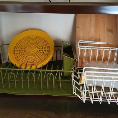 Under the shelf racks, with kitchen dish rack paper plate holders and a nice cutting board
