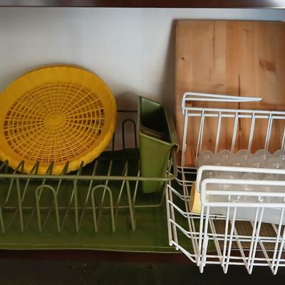 Under the shelf racks, with kitchen dish rack paper plate holders and a nice cutting board