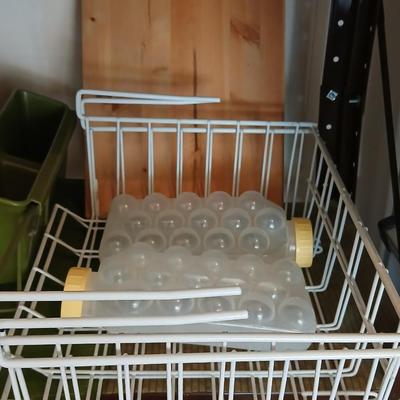 Under the shelf racks, with kitchen dish rack paper plate holders and a nice cutting board