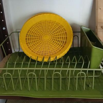 Under the shelf racks, with kitchen dish rack paper plate holders and a nice cutting board