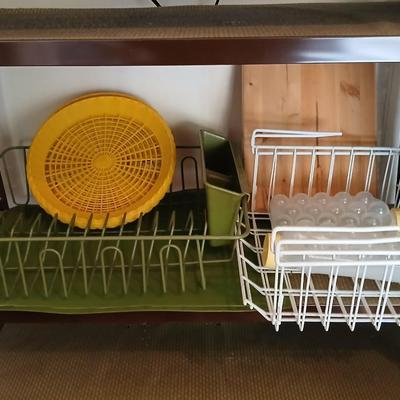 Under the shelf racks, with kitchen dish rack paper plate holders and a nice cutting board