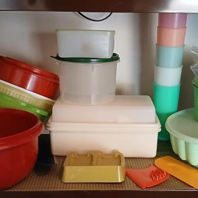 Tupperware brand food storage containers with great utensil gadgets