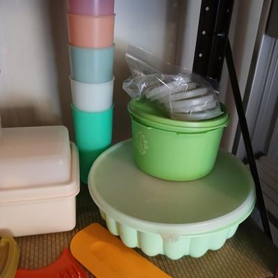 Tupperware brand food storage containers with great utensil gadgets