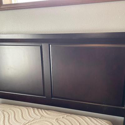 Dark wood headboard