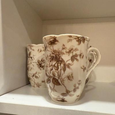 5 Cream and brown mugs