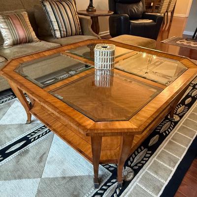 Wood and glass coffee table with bottom shelf