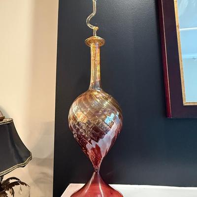 Two iridescent decorative glass pieces